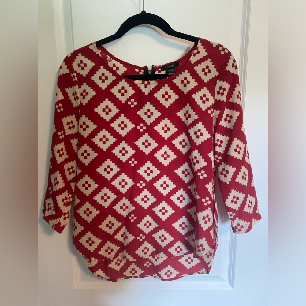 Timing red and white blouse